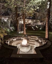 Custom stone fire pit with seating area