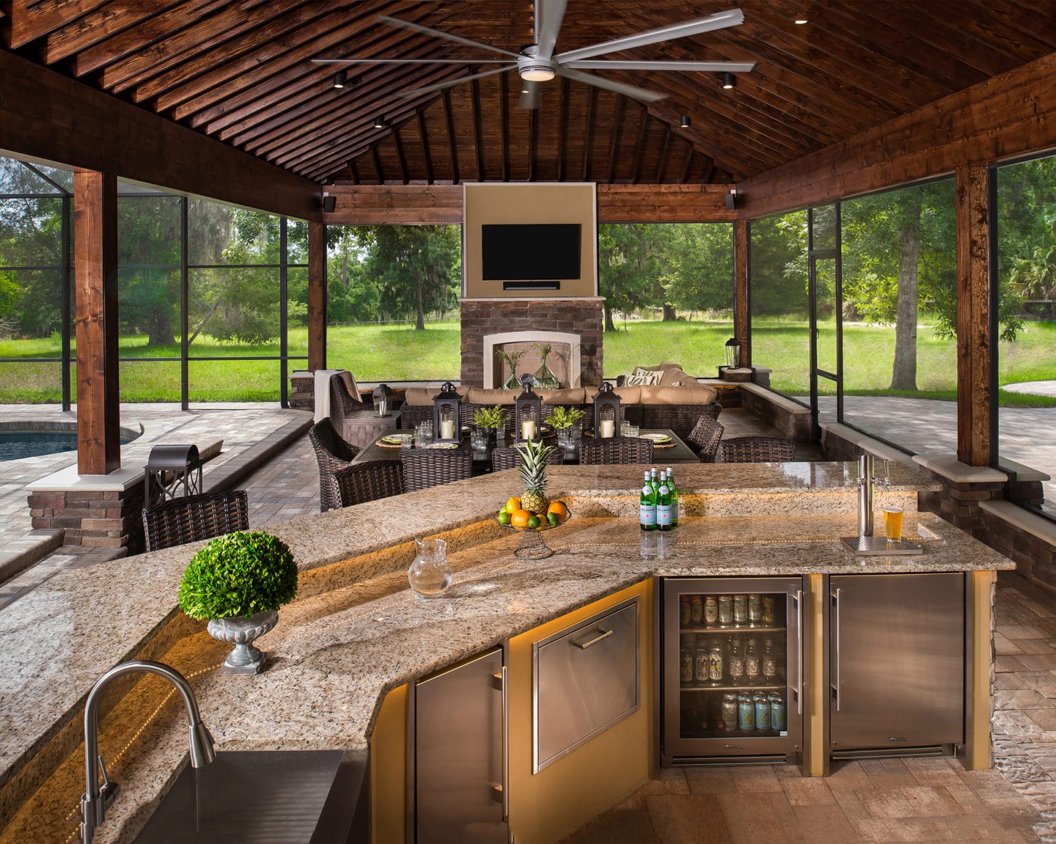 Custom outdoor kitchen with bar and grill